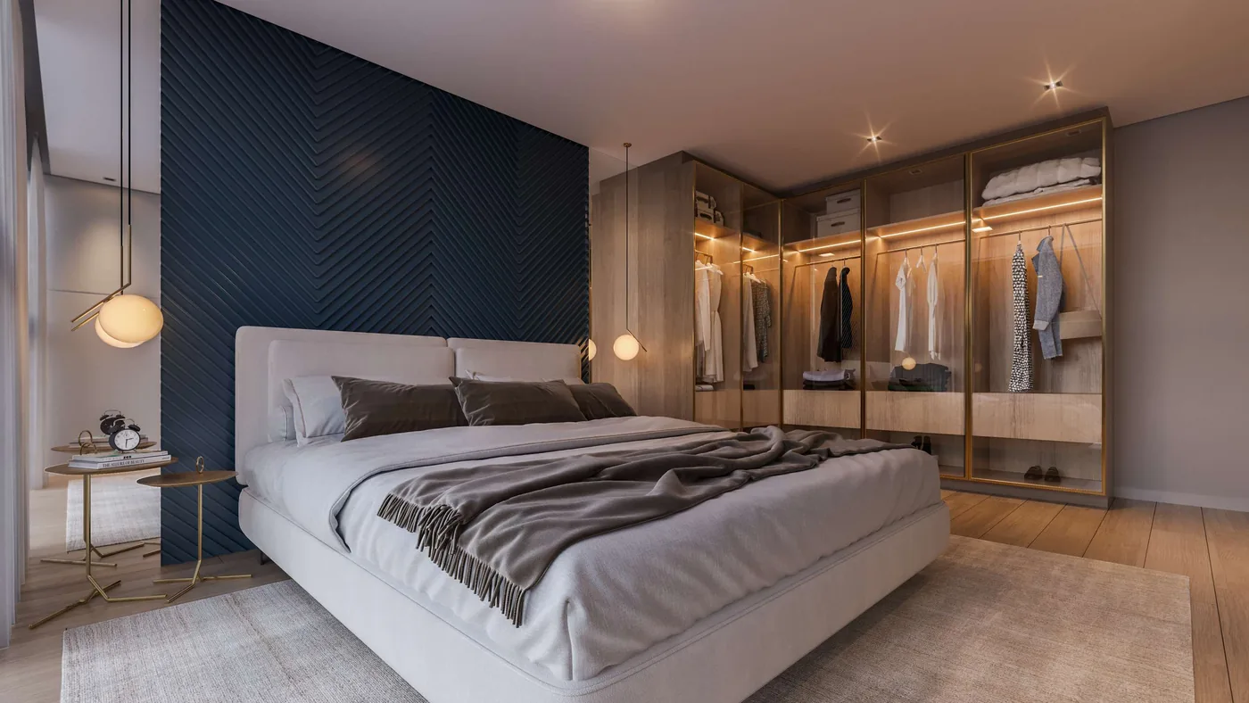 Suíte com cabeceira em painel azul escuro, cama de casal e closet aberto ao fundo
