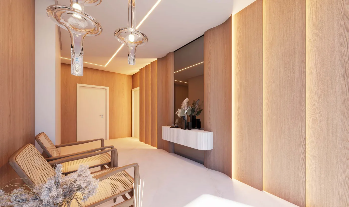 Hall de entrada mobiliado, com parede ripada de madeira clara, aparador, poltronas de palhinha e pendentes de vidro
