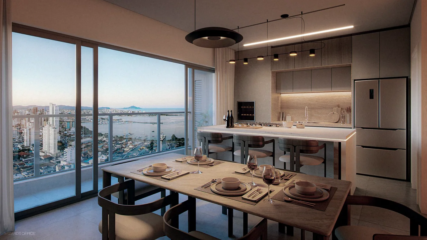 Sala de jantar com mesa posta para oito, cozinha integrada ao fundo e janela corrida para a cidade e o rio