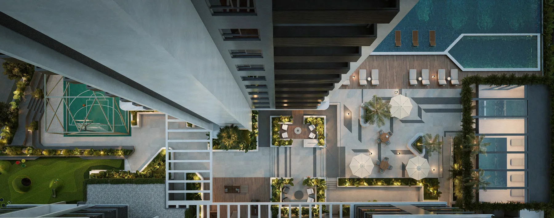 O pavimento de lazer visto de cima, com a piscina externa, os decks, a vegetação e os ambientes cobertos em volta