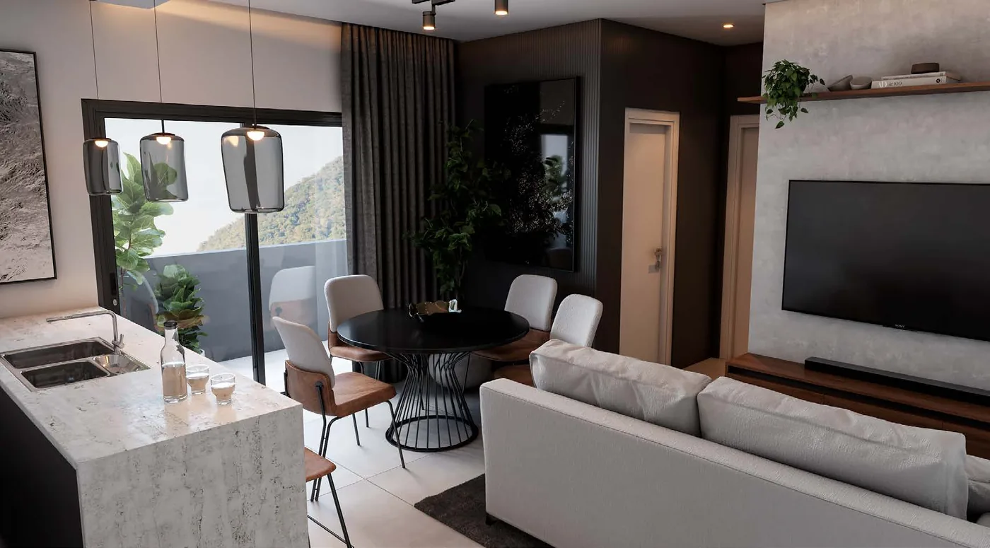Living integrado à cozinha, com ilha de pedra clara, sofá branco, painel de televisão em madeira e porta aberta para a sacada