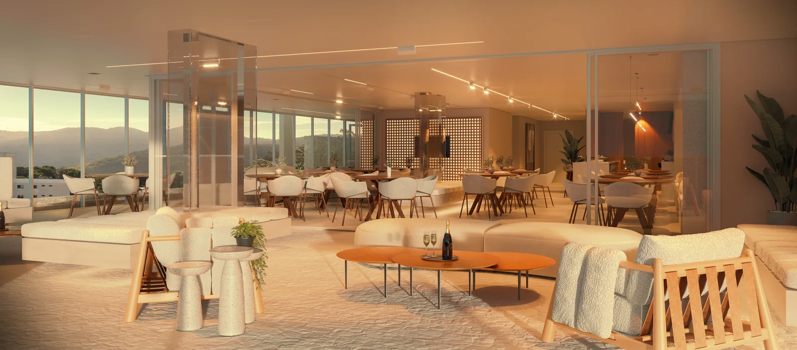 Lounge de convívio do Marine aberto para o mar, com sofás baixos, mesas de apoio e vegetação nas jardineiras, ao fim da tarde