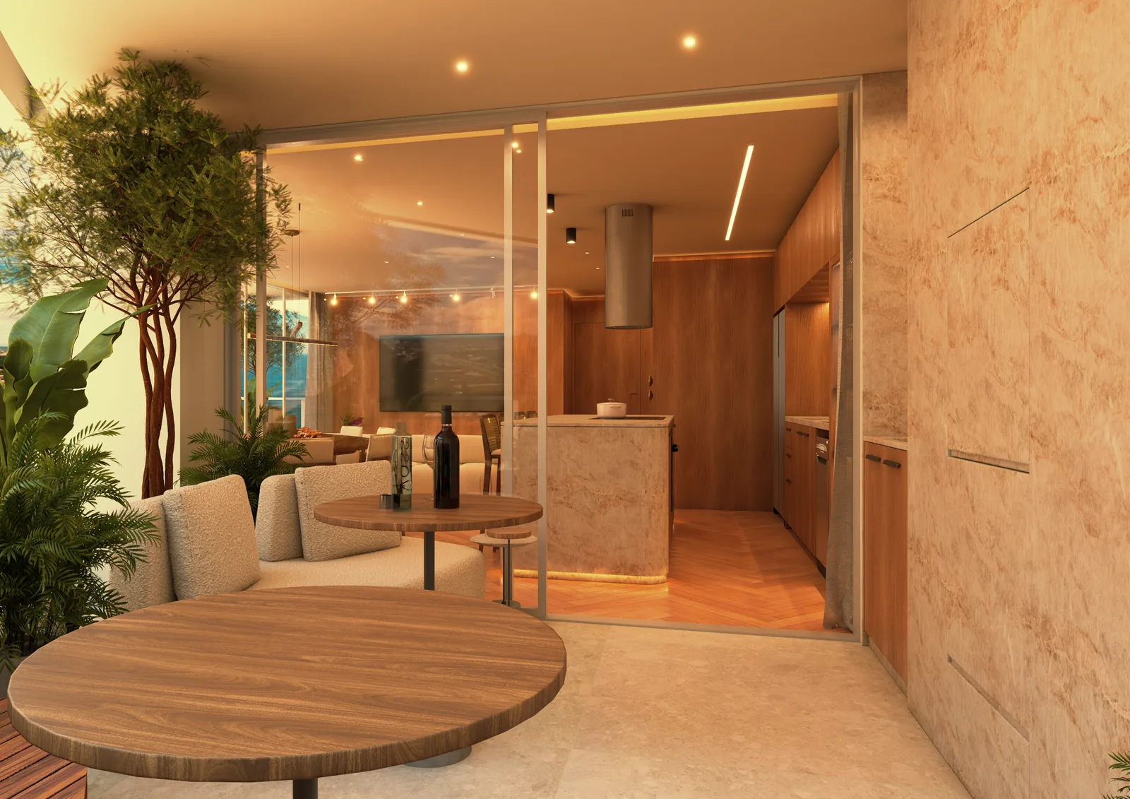 Varanda curva de um apartamento do Marine, com mesa de refeições, churrasqueira embutida e guarda-corpo de vidro sobre o mar