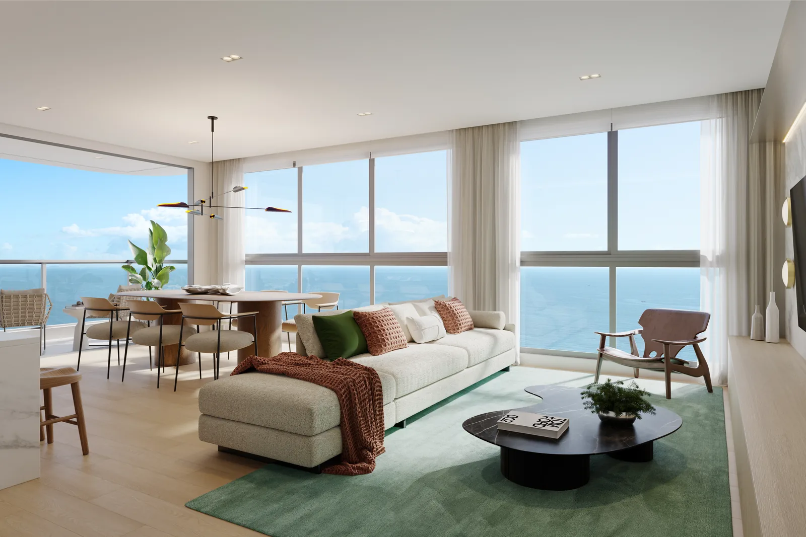 Sala de estar de um apartamento do Punta Cana Residence, com sofá claro, mesa de jantar ao lado e porta de vidro aberta para a varanda
