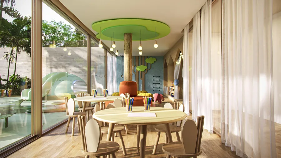 Brinquedoteca com forro circular verde, mesa infantil e porta de vidro para o jardim