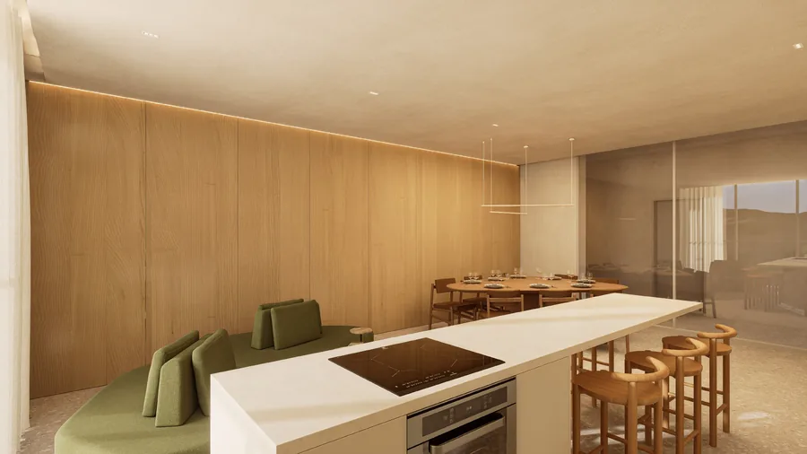 Espaço gourmet com ilha de cozinha, banquetas e painel de madeira