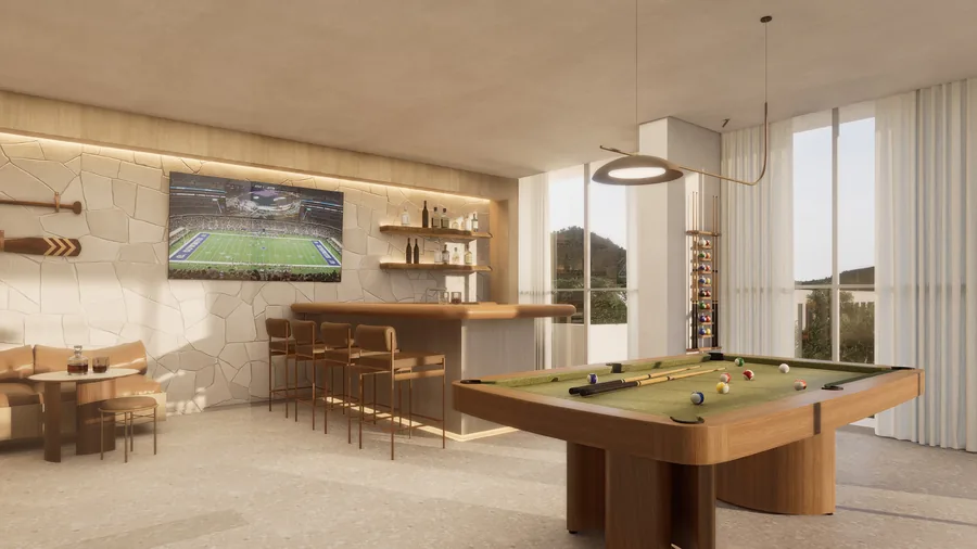 Sport lounge com mesa de sinuca, bancada de bar e televisão na parede
