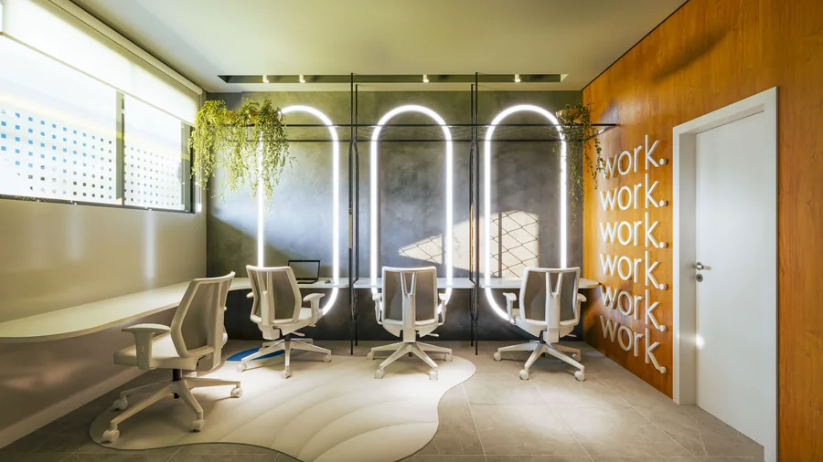 Coworking com estações de trabalho curvas, cadeiras giratórias e letreiro neon na parede