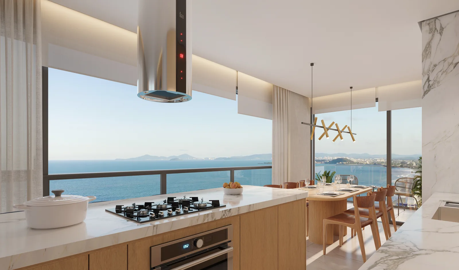 Área de jantar de um apartamento do Vivatto, com mesa para seis, luminária pendente e o mar pela janela ao fundo